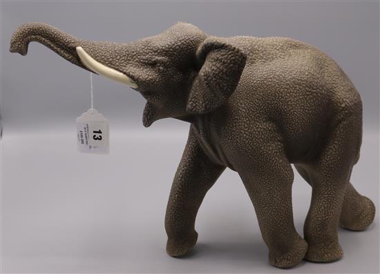 A Sevres Vinsare model of a trumpeting elephant, L.18in.